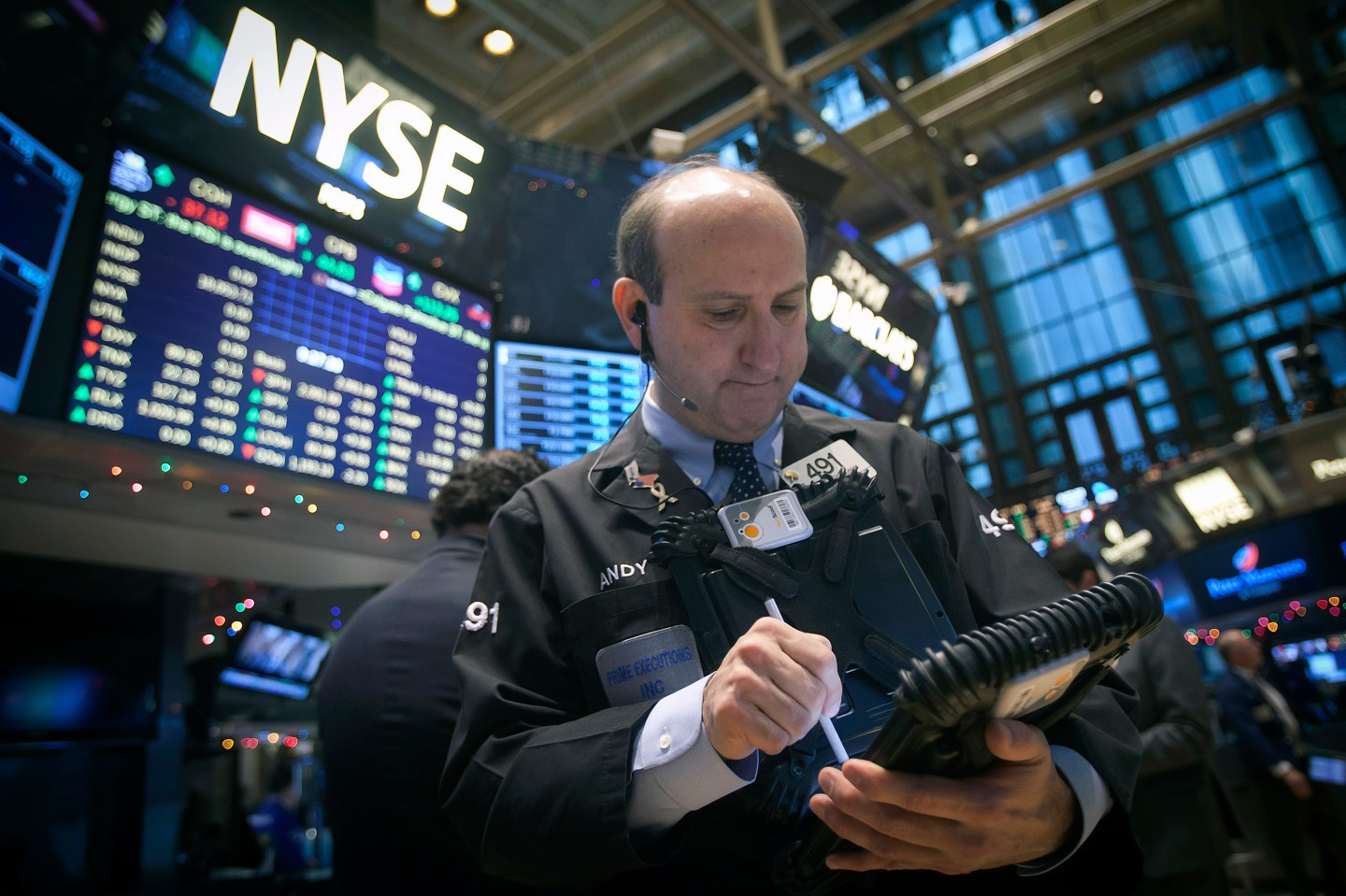 Traders work on the floor of the NYSE in New York