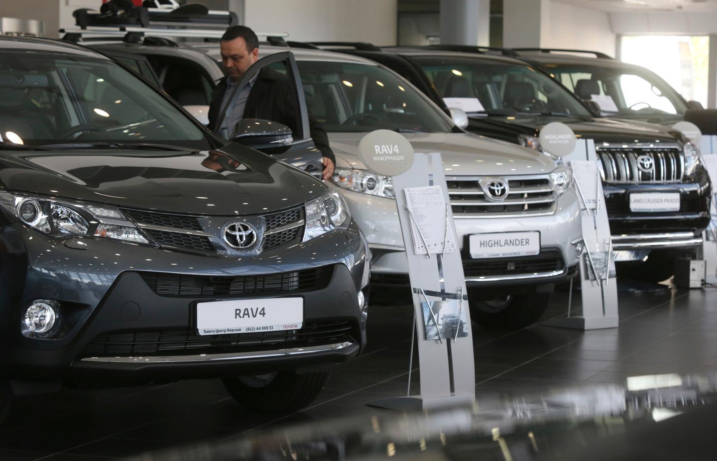 Automobiles are on display at a Toyota car sales and show room in St. Petersburg
