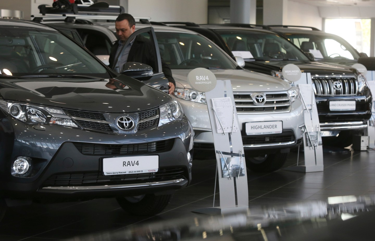 Automobiles are on display at a Toyota car sales and show room in St. Petersburg
