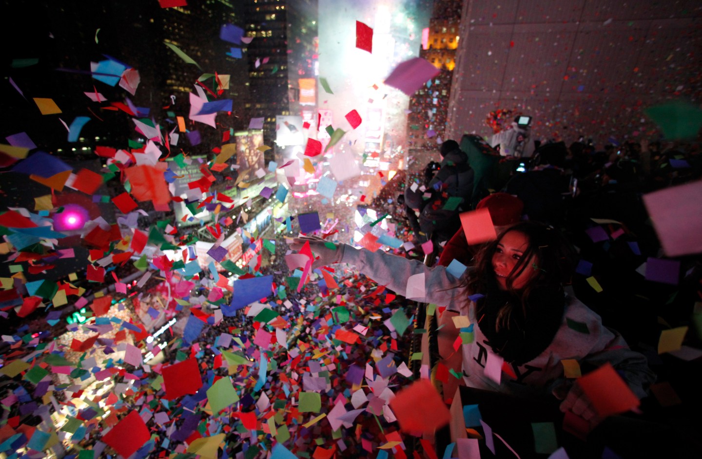 Confetti is dropped on revelers at midnight during New Year's Eve celebrations in Times Square in New York