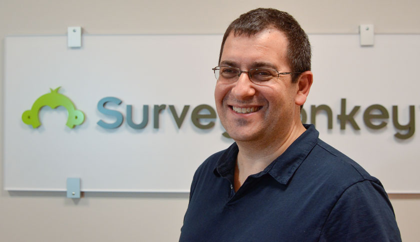 SurveyMonkey CEO David Goldberg with company logo