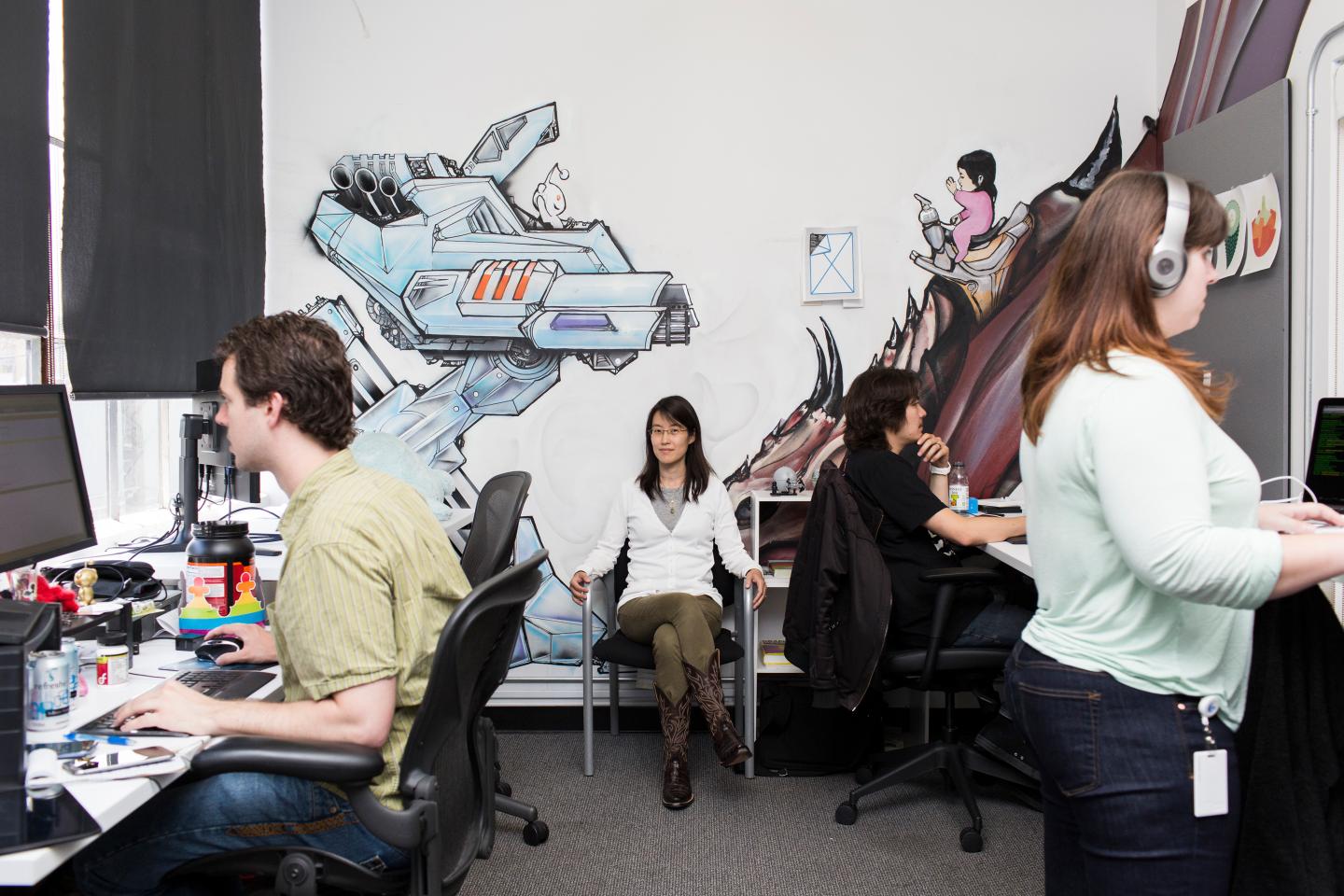 Ellen Pao, center, Reddit?s business and partnerships strategist, at the popular website's offices in San Francisco.