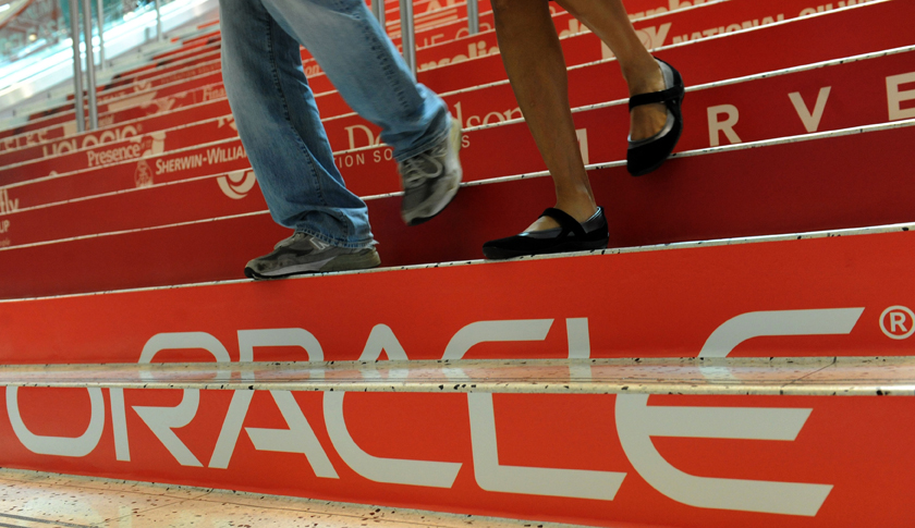 Attendees walk down branded steps at the 29th Oracle OpenWorld in San Francisco
