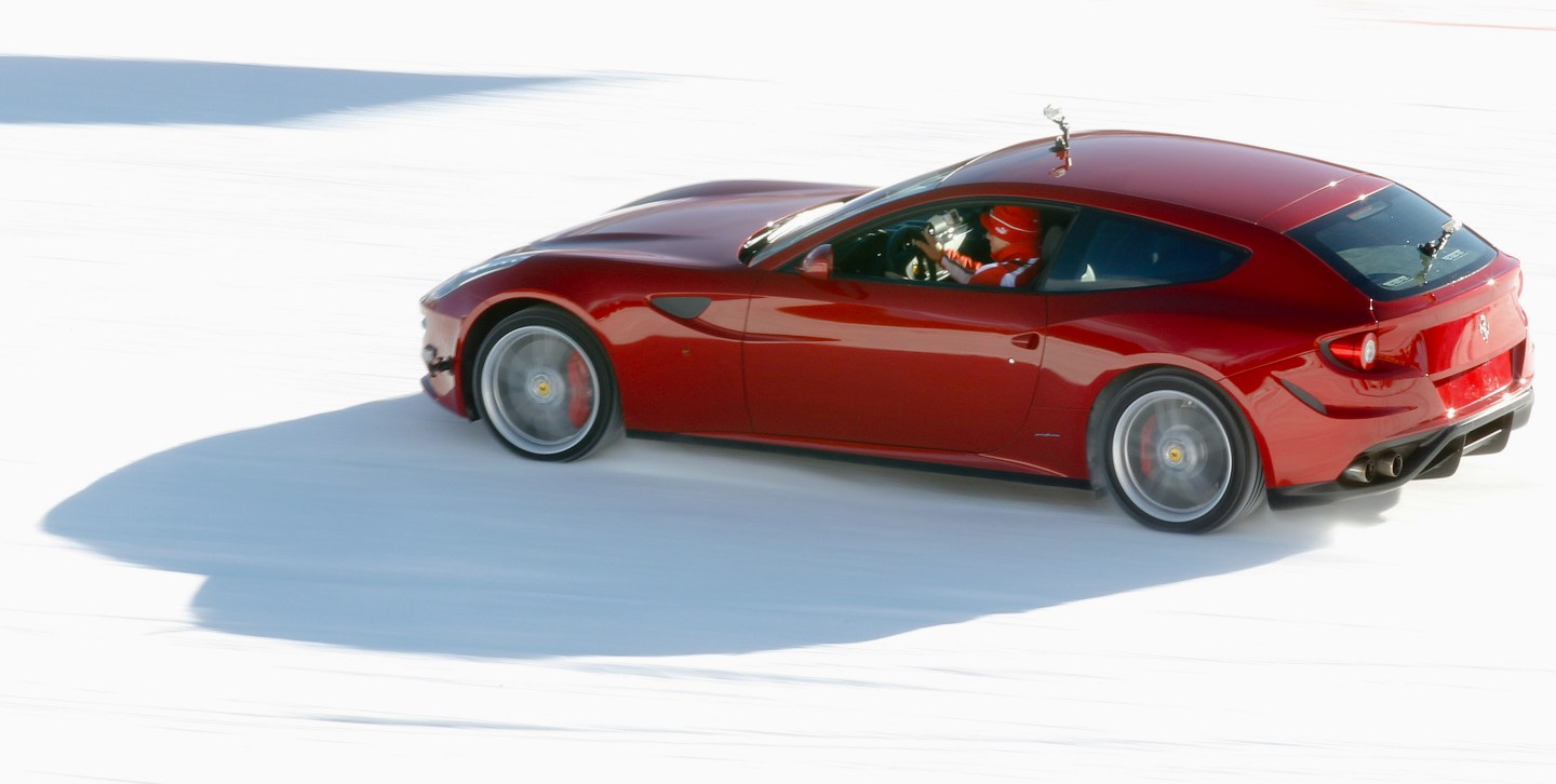 A new model of Ferrari FF car is seen as it races on the snow during the "Wrooom, F1 and MotoGP Press Ski Meeting" in Madonna di Campiglio