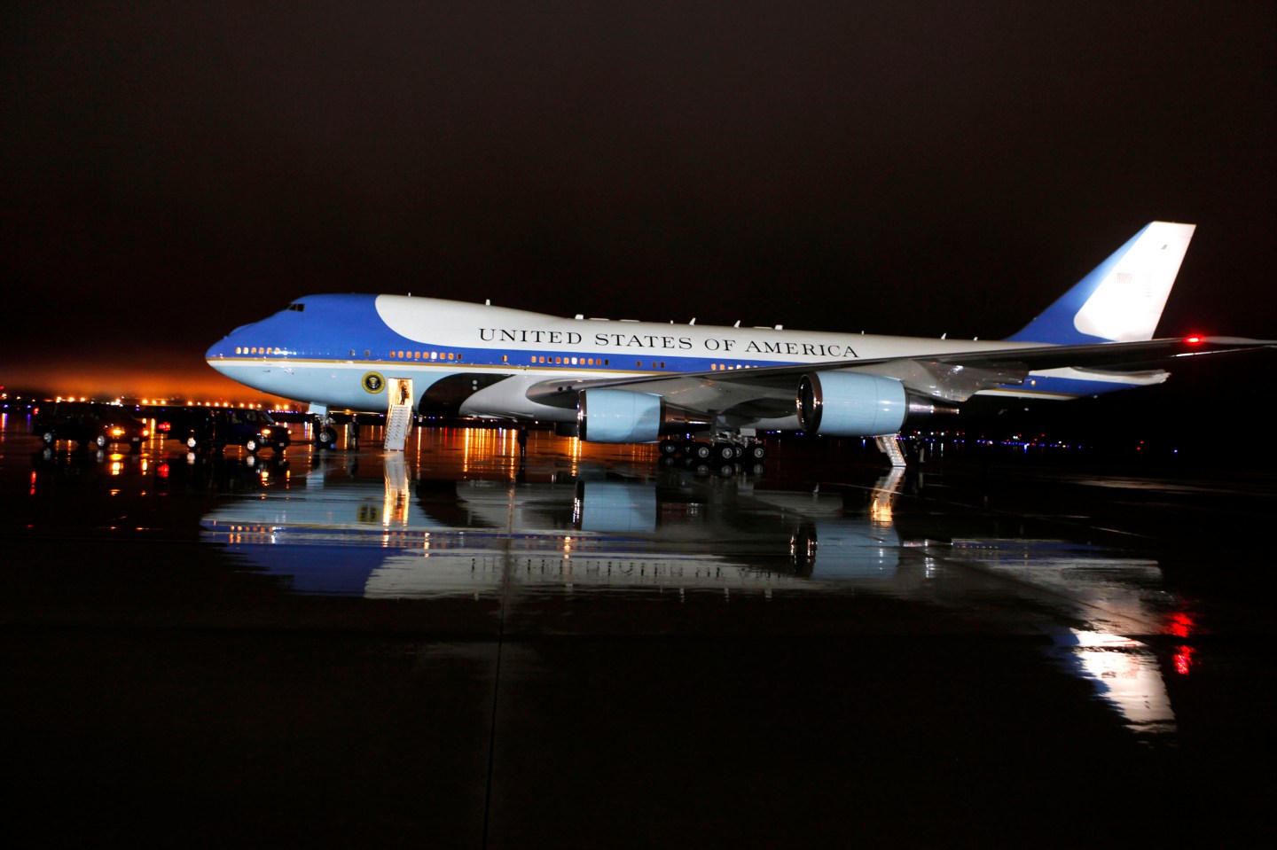 Air Force One sits on the rainy tarmac at Joint Base Andrews after a rainstorm blew through the Washington region after midnight