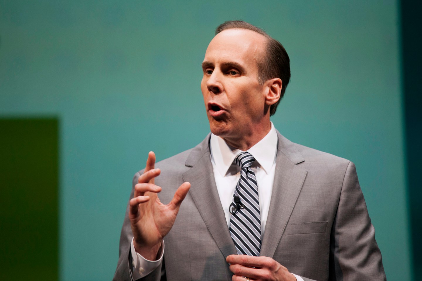 Troy Alstead, Chief Operating Officer of Starbucks, is pictured on stage during the company's annual shareholders meeting in Seattle