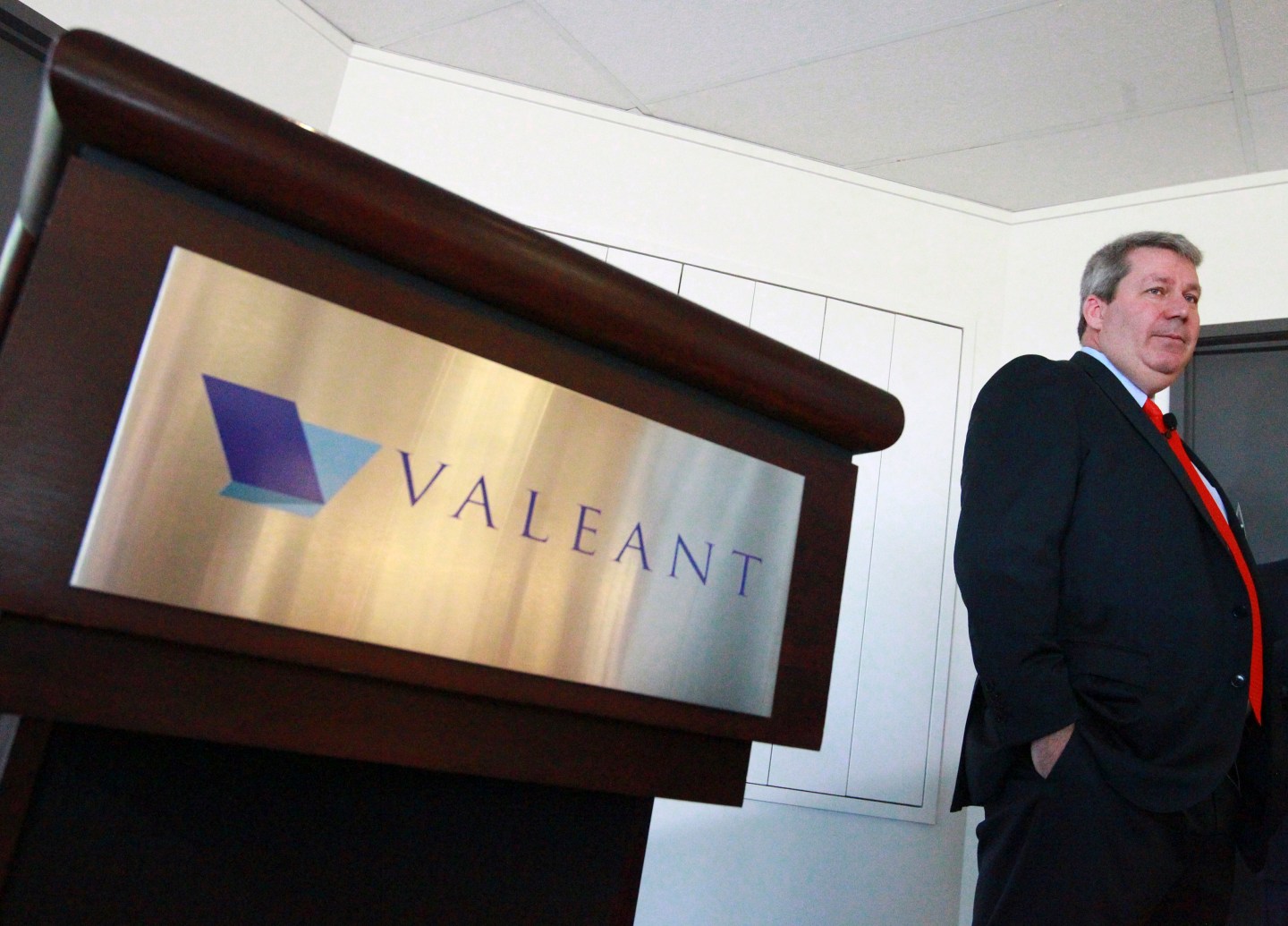 J. Michael Pearson, Chairman of the board and Chief Executive Officer of Valeant Pharmaceuticals International Inc., waits for the start of their annual general meeting in Laval, Quebec