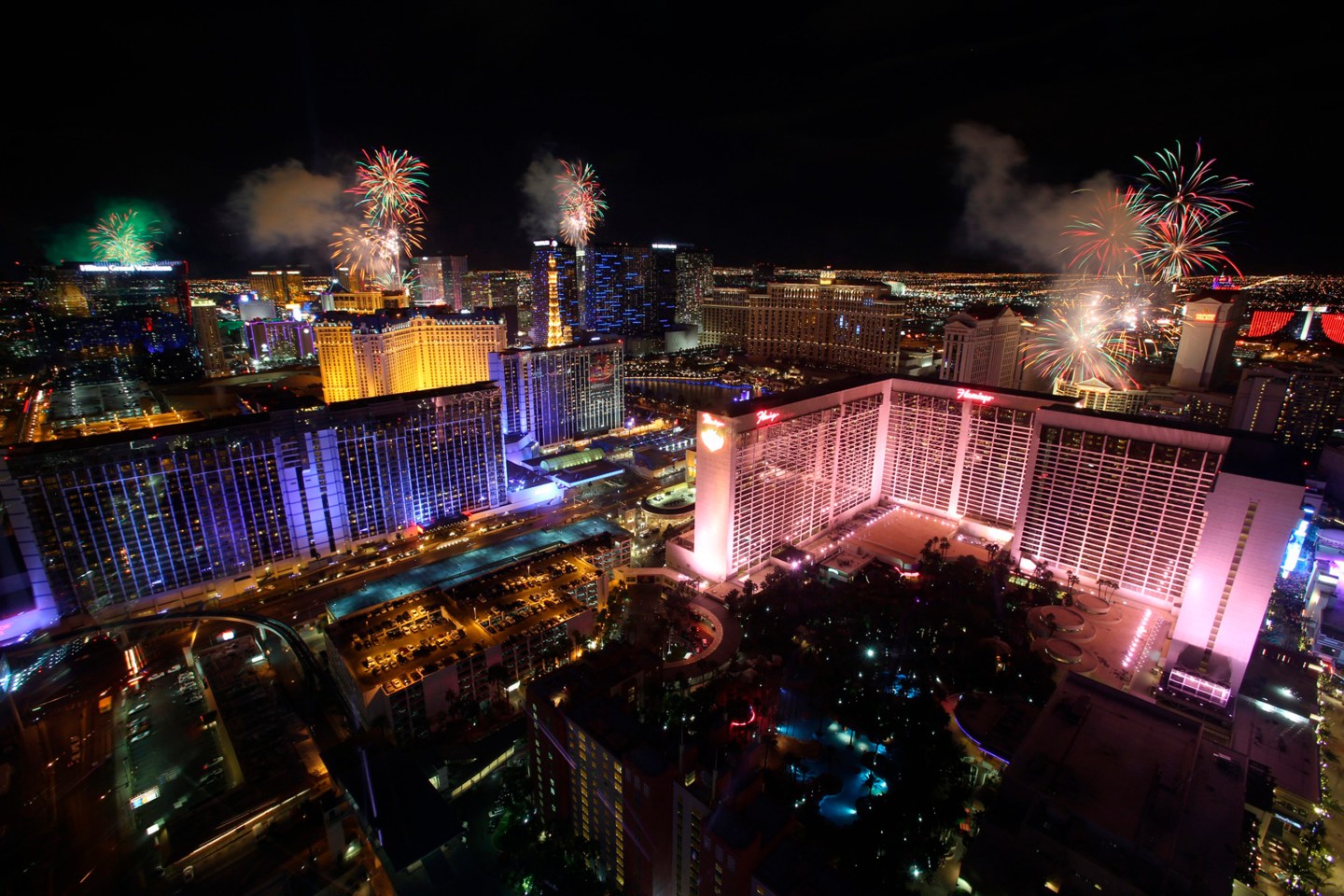New Year's fireworks explode over Las Vegas Strip casinos in this view from the High Roller observation wheel in Las Vegas
