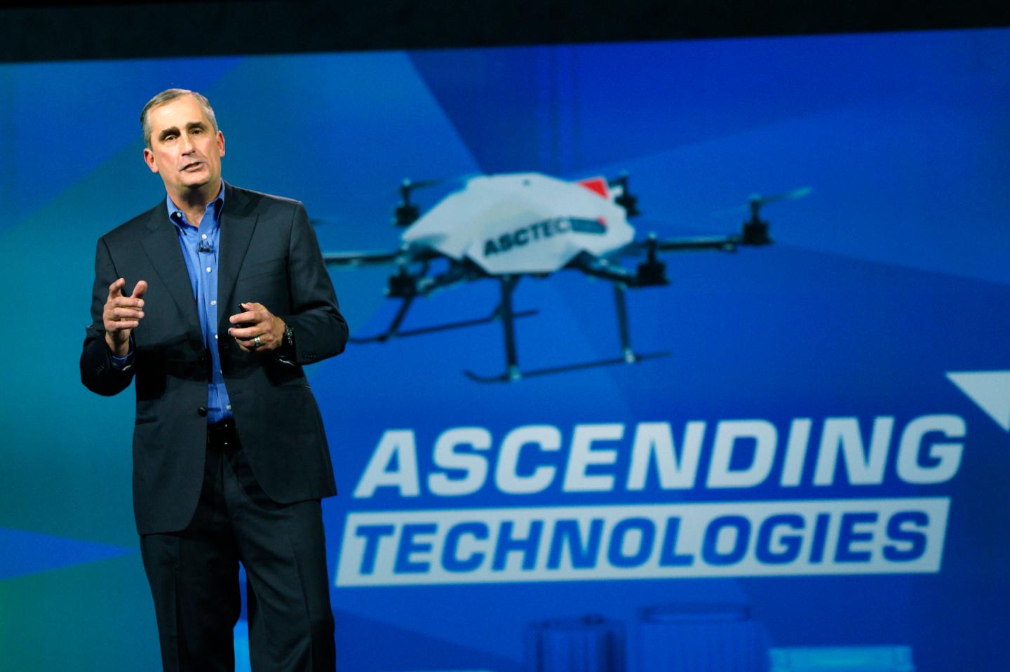 Intel CEO shows wrist-worn drone; promises to employ more women