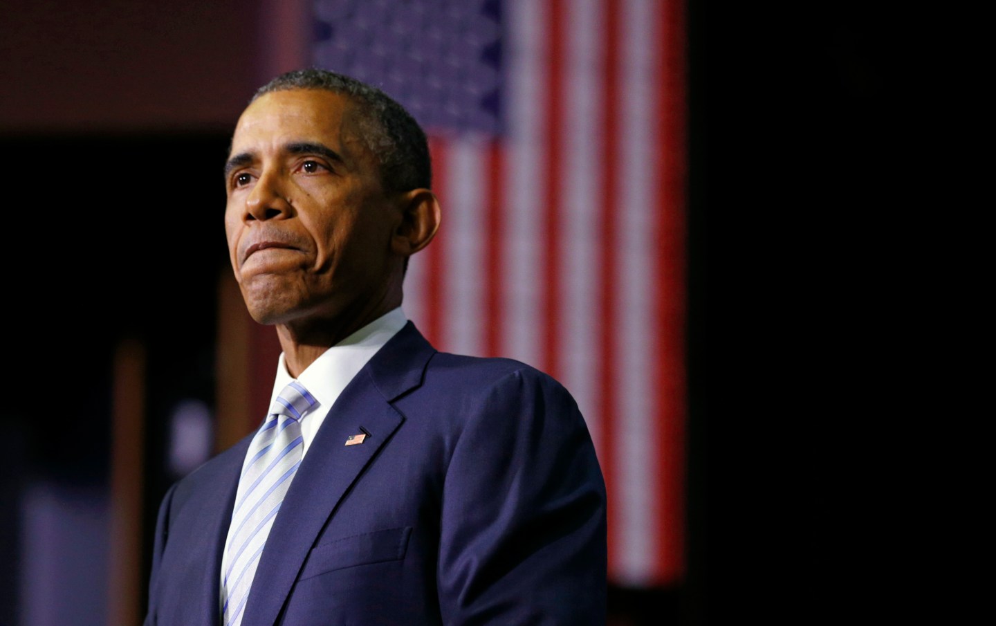 Obama pauses while speaking about college cost initiatives during a visit to Pellissippi State College in Knoxville