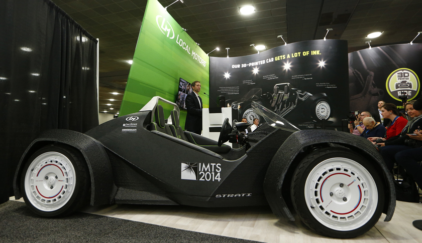 Local Motors showcase the world's first 3-D printed car during the first press preview day of the North American International Auto Show (NAIAS) in Detroi