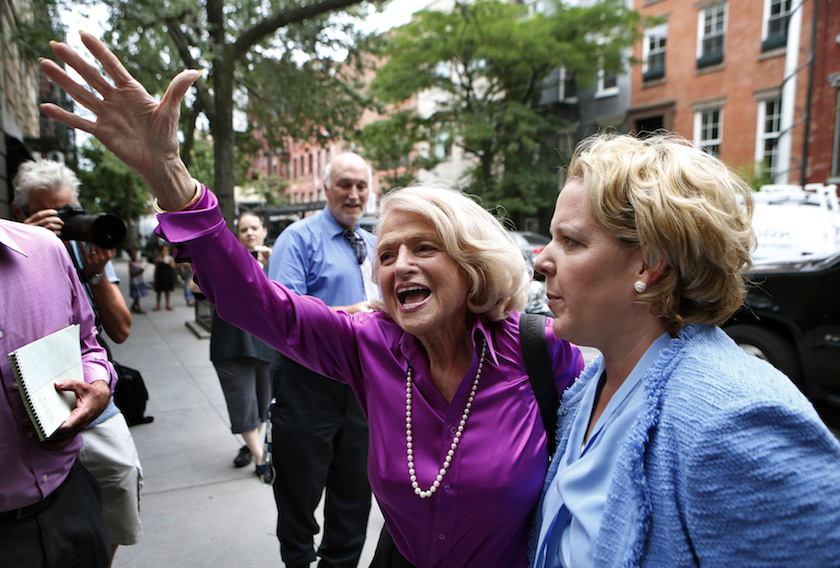 Edith "Edie" Windsor reacts to cheers as she arrives for a news conference following the U.S. Supreme Court 5-4 ruling striking down as unconstitutional the Defense of Marriage Act, in New York
