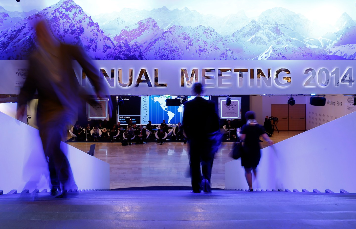 Participants take a break between sessions of World Economic Forum in Davos