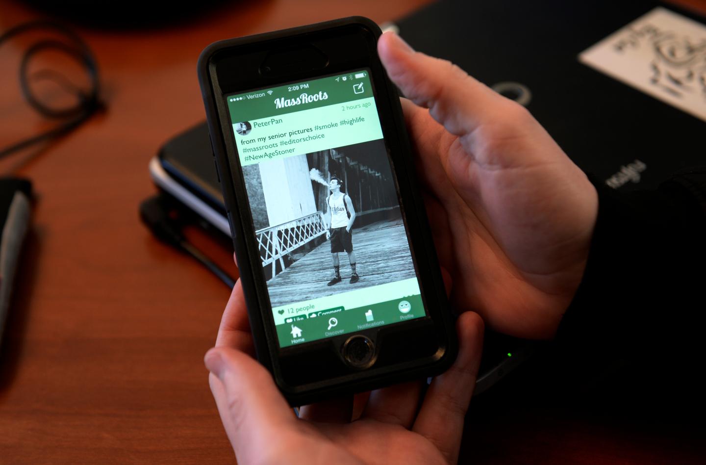 DENVER, CO. - JANUARY 22: Isaac Dietrich, CEO of MassRoots, displays his app at his office in Denver, CO on January 22, 2015. The companies cannabis oriented social networking app, MassRoots, was pulled from Apple's App Store in November after 14 months. "Apple's policies are stifling innovations in the cannabis industry to a greater extent than the federal government," Dietrich said. (Photo By Craig F. Walker / The Denver Post)