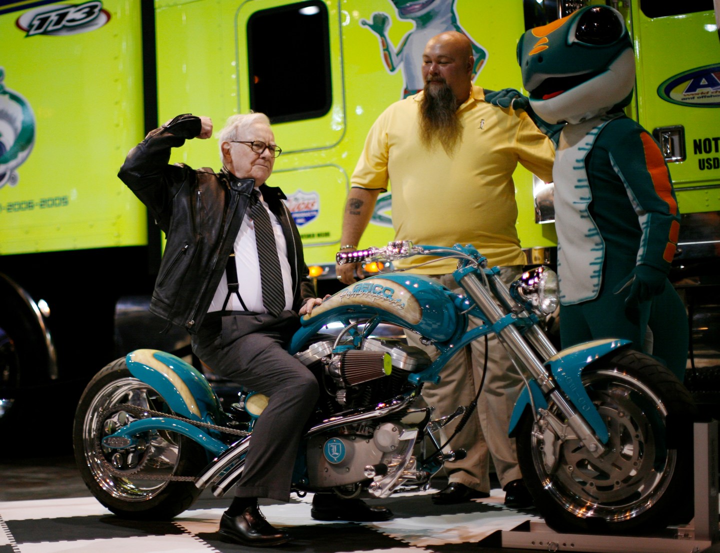 Billionaire financier and Berkshire Hathaway CEO Warren Buffett poses on a motorcycle during Berkshire Hathaway Annual Shareholders meeting in Omaha