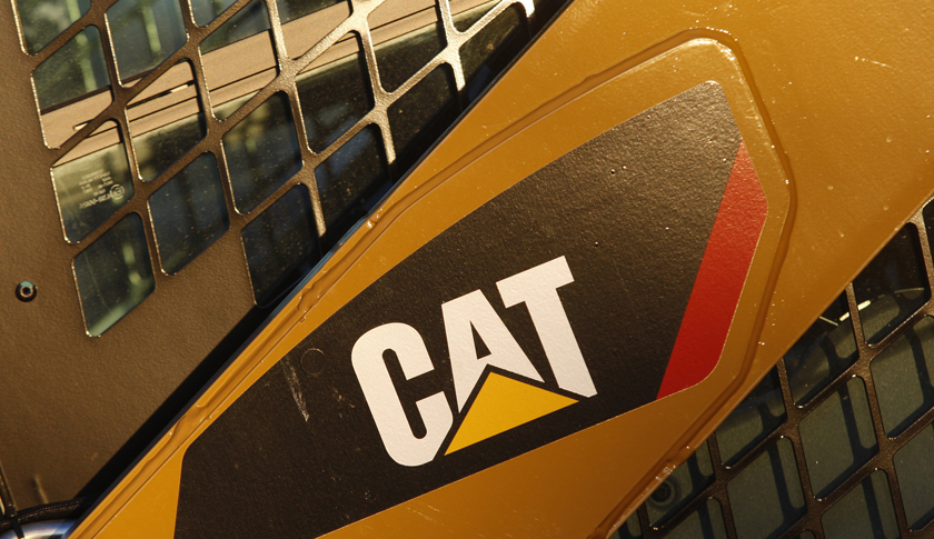 The CAT logo is seen on the side of a Caterpillar machine on a lot at Milton CAT in North Reading, Massachusetts