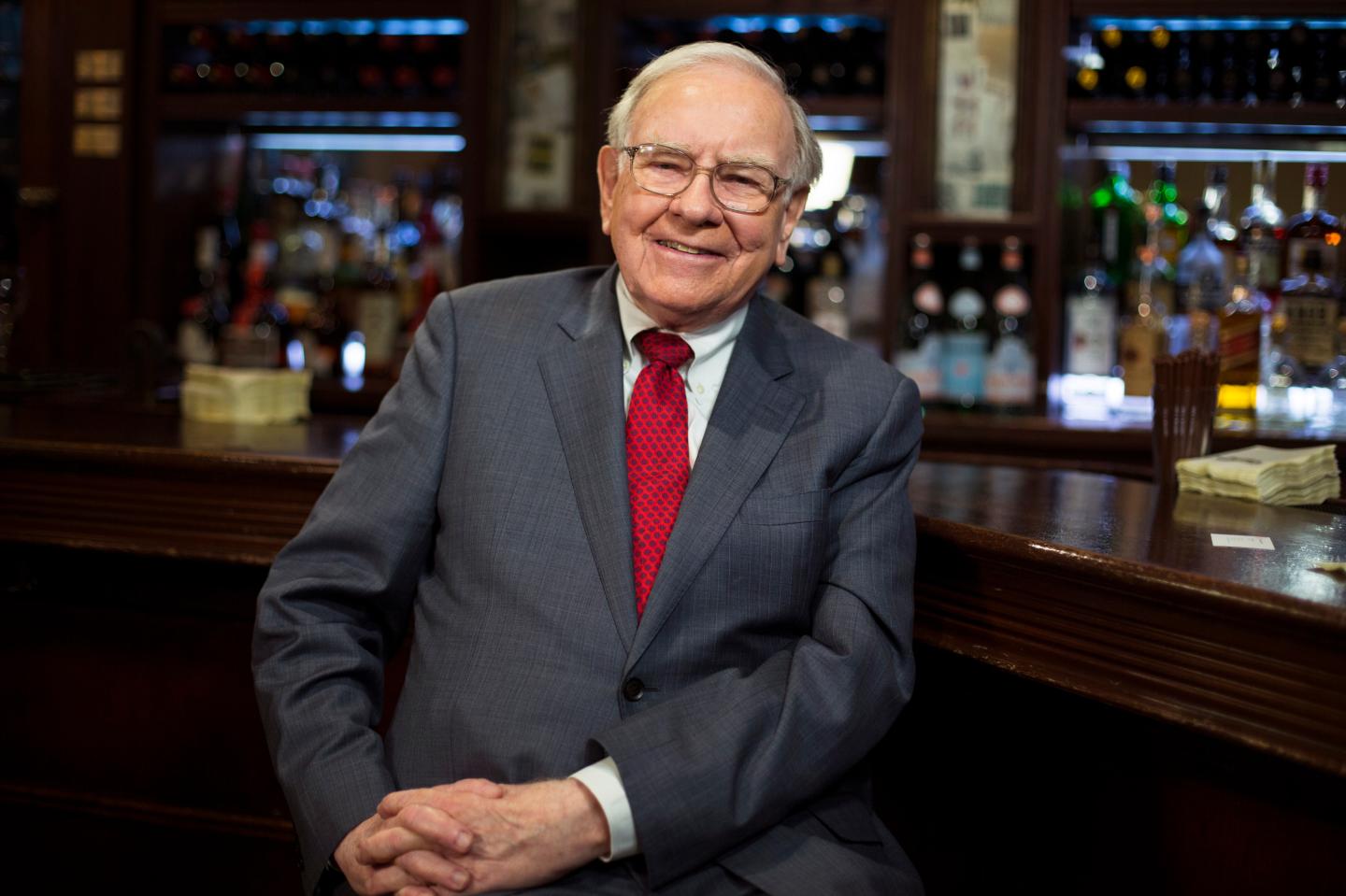 Investor Warren Buffett poses for a portrait during an interview after a luncheon to benefit the Glide Foundation of San Francisco in New York