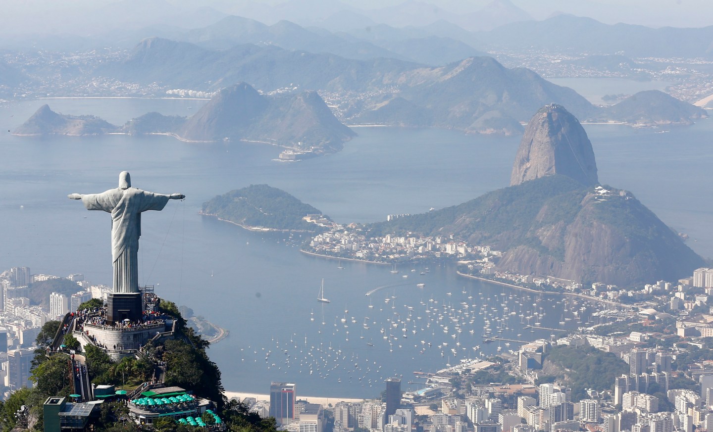 Tourists visit the Christ the Redeemer statue in Rio de Janeiro