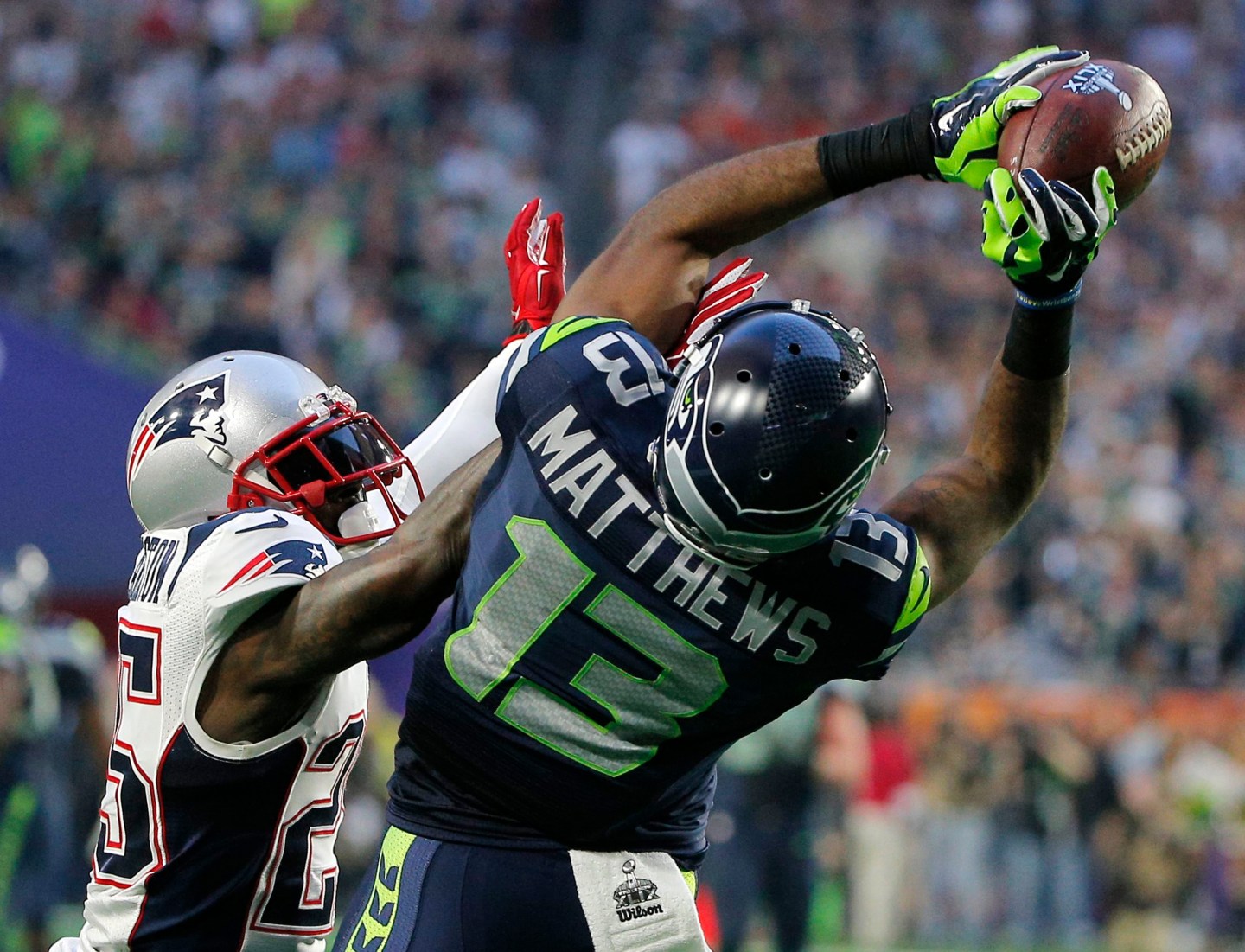 Seattle Seahawks wide receiver Matthews catches a pass against New England Patriots cornerback Arrington in the second quarter during the NFL Super Bowl XLIX football game in Glendale