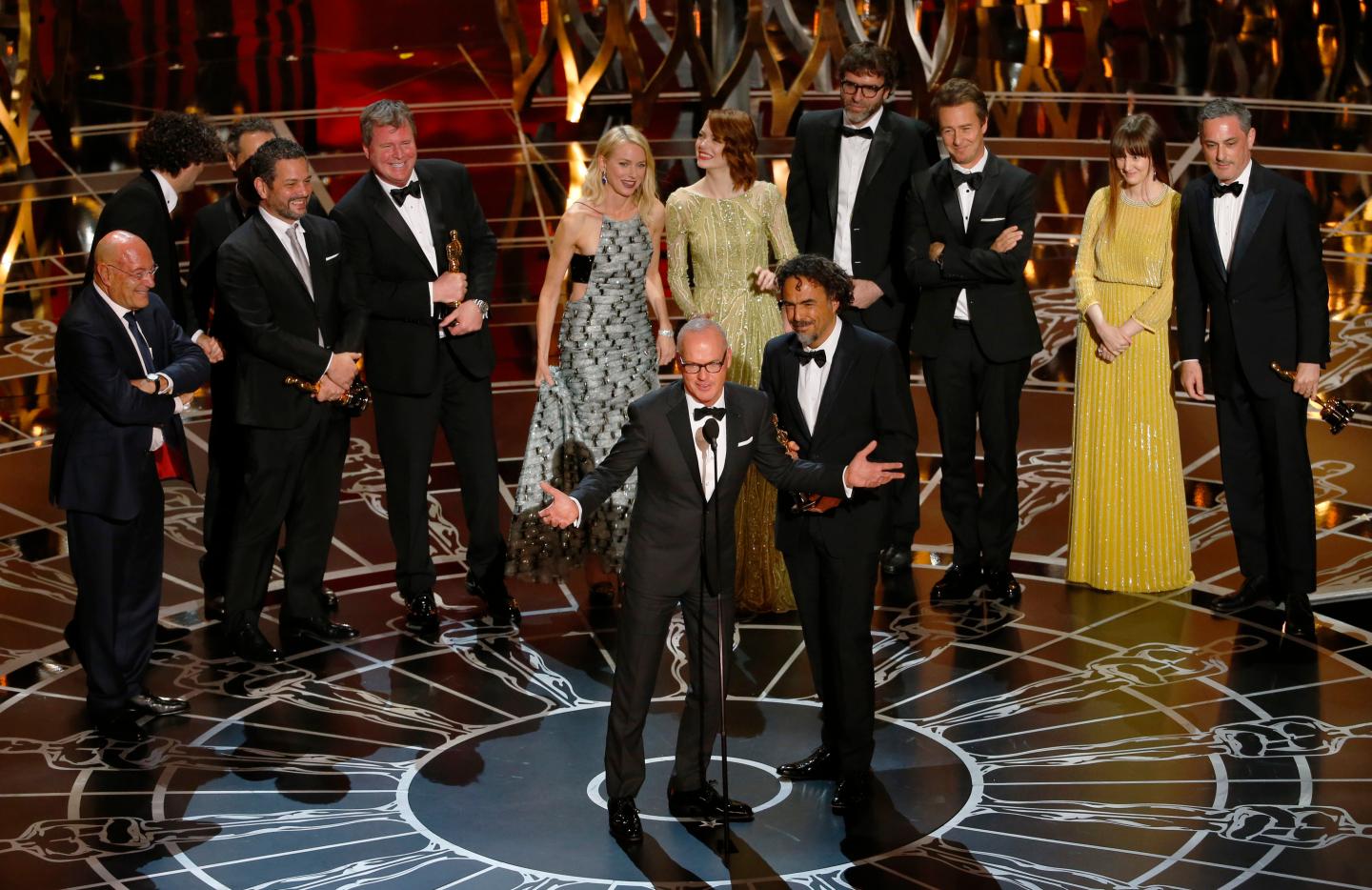 Actor Keaton and director Inarritu accept the Oscar for best picture for his film "Birdman"during the 87th Academy Awards in Hollywood