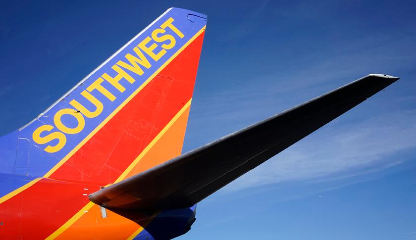 A Southwest Airlines jet waits on the tarmac at Denver International Airport in Denver