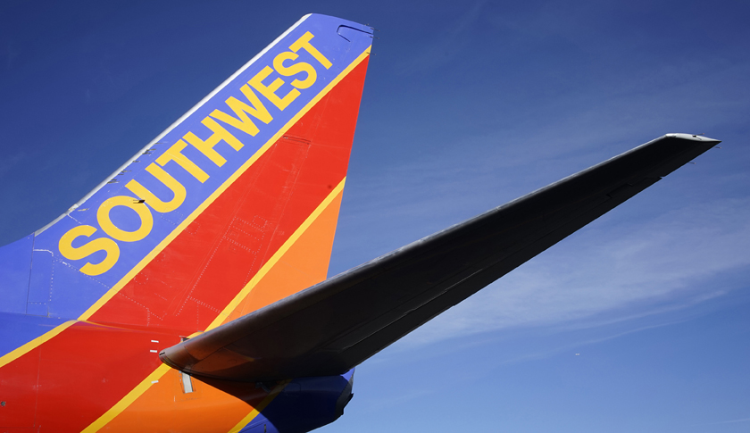 A Southwest Airlines jet waits on the tarmac at Denver International Airport in Denver