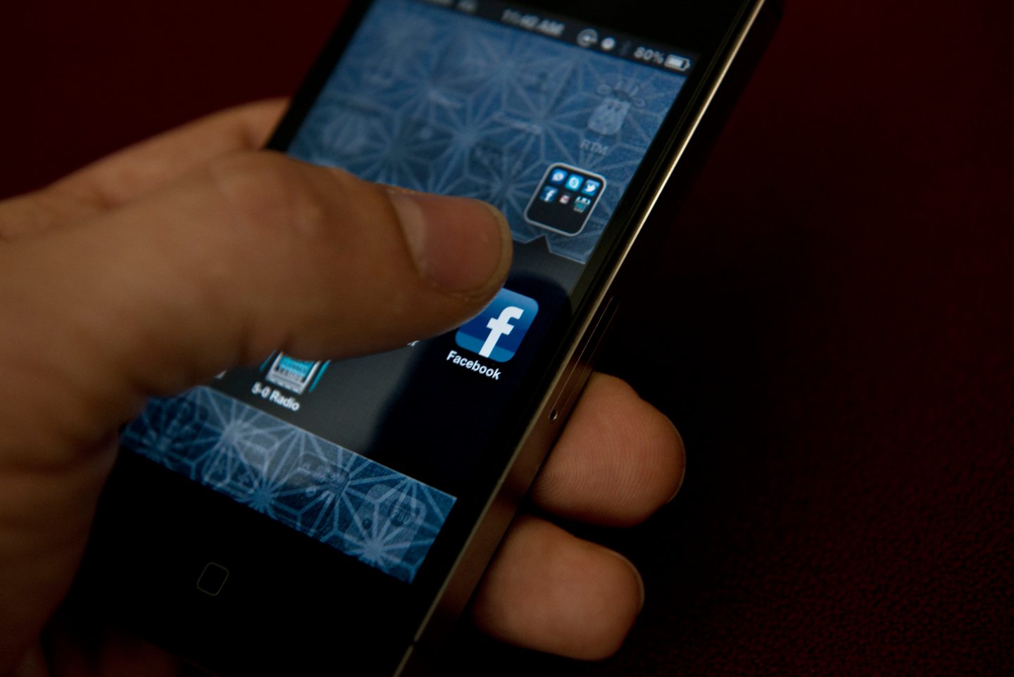 An Apple iPhone displays Facebook's messaging app on May 10, 2012 in Washington, DC.