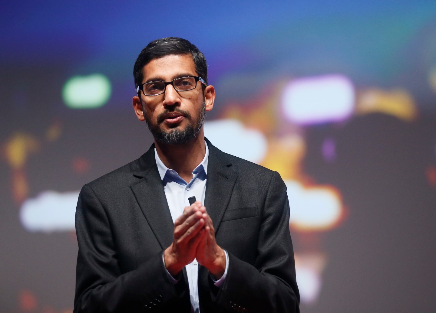 Sundar Pichai, Google's senior vice president of products, speaks during a presentation at the Mobile World Congress in Barcelona