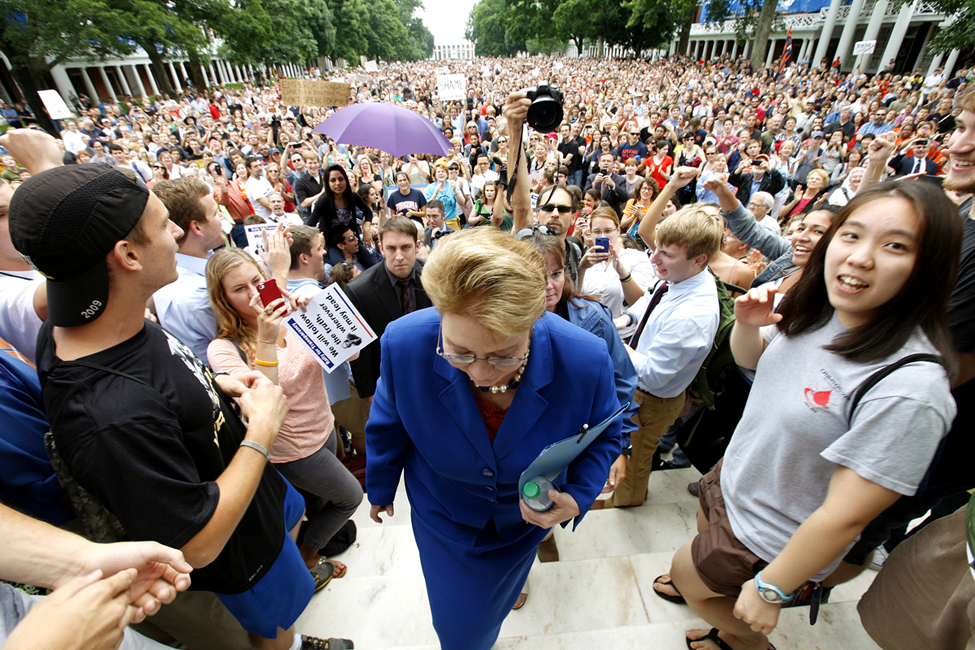 University of Virginia President Teresa Sullivan makes her way up the steps of the Rotunda