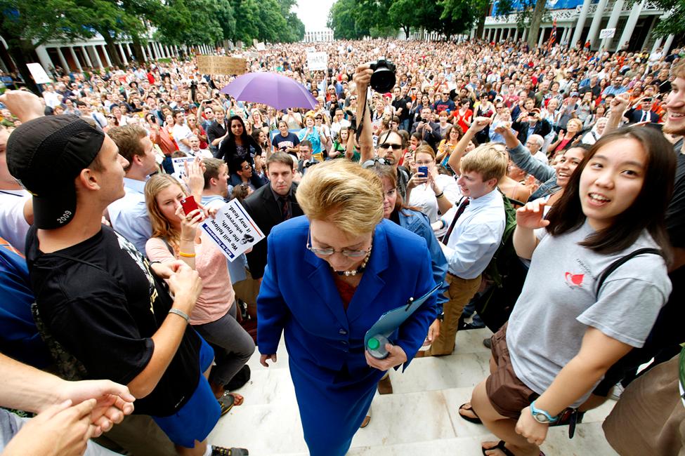 University of Virginia President Teresa Sullivan makes her way up the steps of the Rotunda