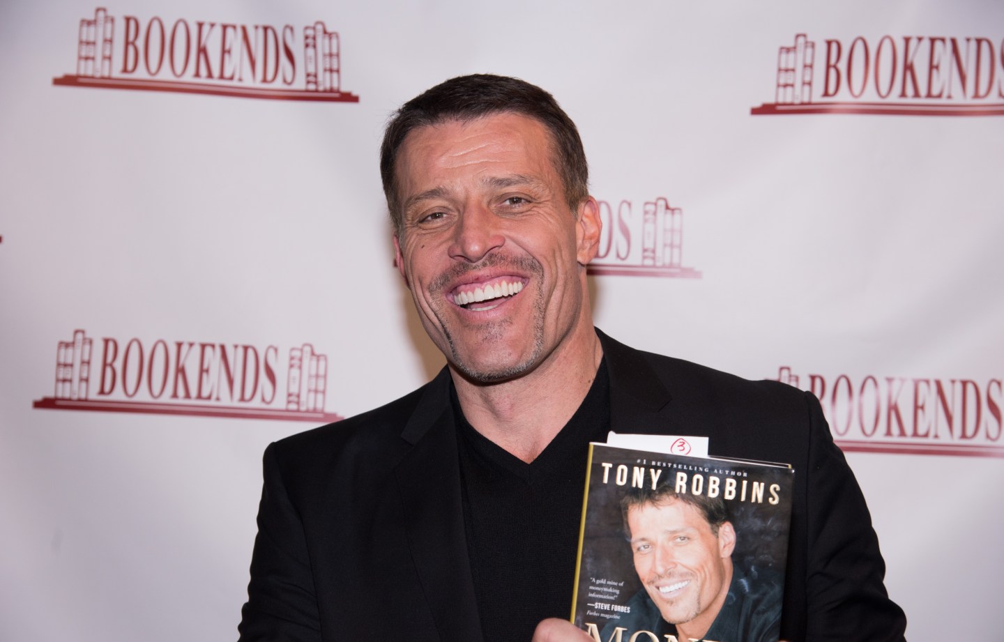Tony Robbins Signs Copies Of His Book "Money: Master Of The Game"