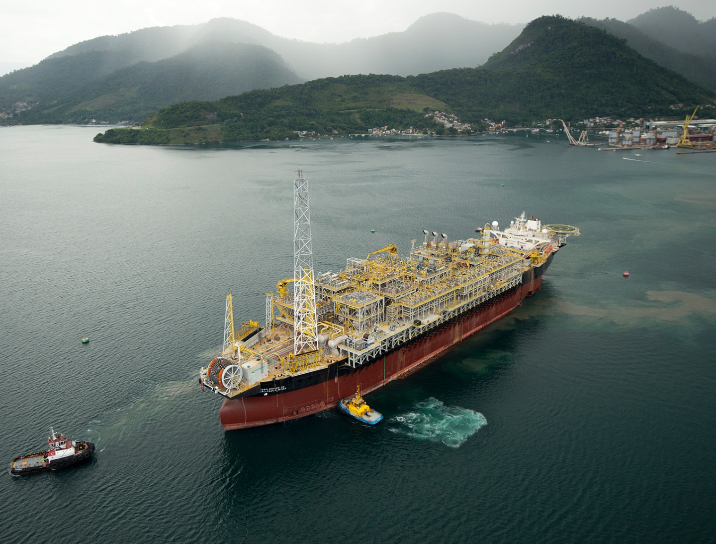 BG Brazil: FPSO Cidade de Sao Paulo departs from Brasfels shipyard, FPSO Cidade de Paraty in background.