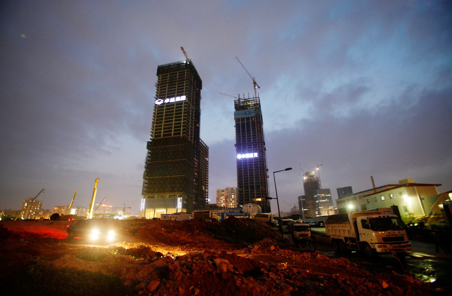Buildings in construction are seen at Excellence Real Estate Group's construction site in Qianhai district of Shenzhen