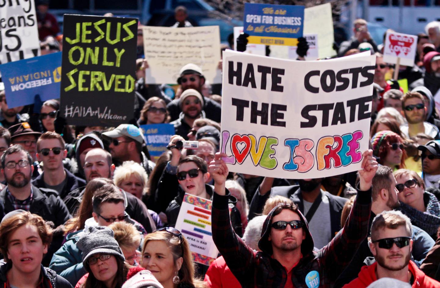 Demonstrators gather to protest a controversial religious freedom bill in Indianapolis