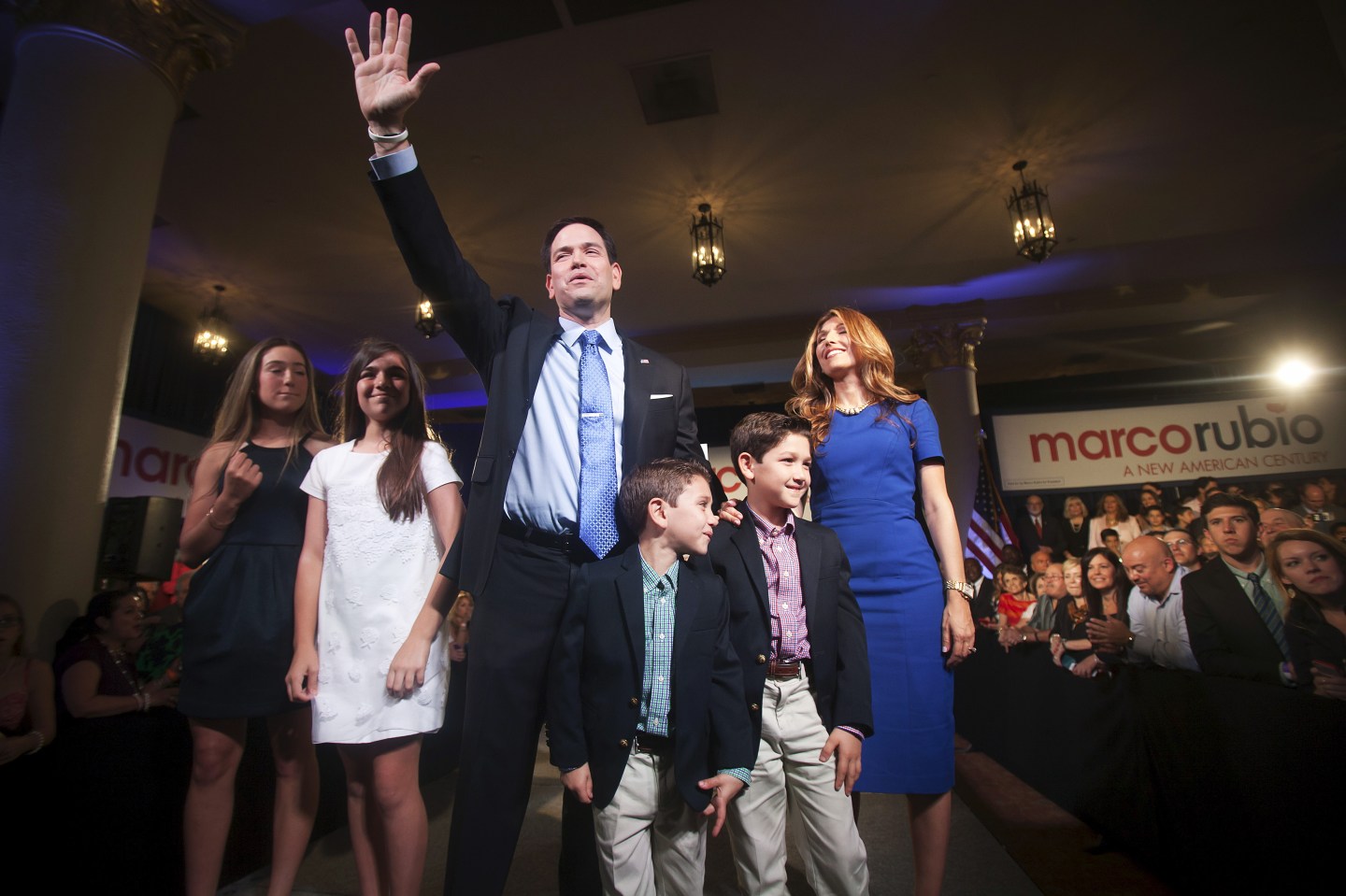 U.S. Senator Rubio waves on stage with his family after he announced his bid for the White House in 2016 at the Freedom Tower in Miami