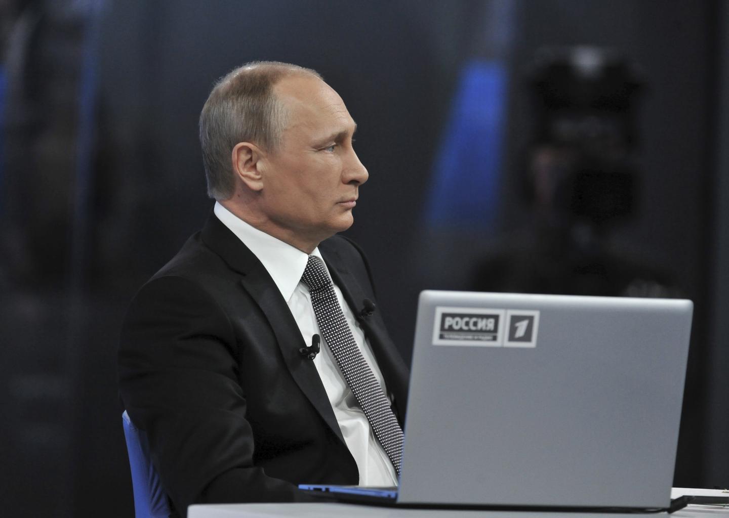 Putin takes part in a live broadcast call-in in Moscow