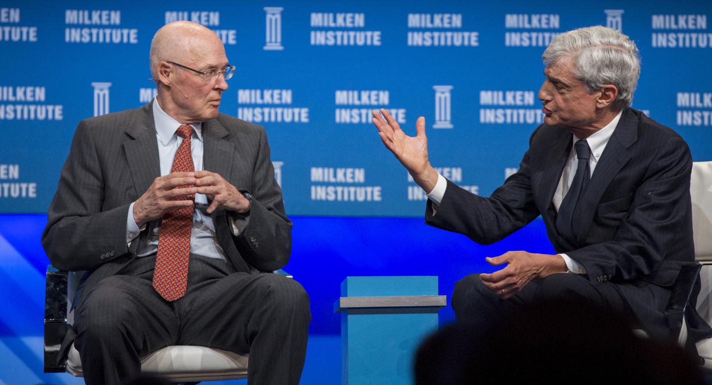 Former U.S. Treasury Secretaries Paulson and Rubin attend a panel discussion titled "The Global Economy" at the Milken Institute Global Conference in Beverly Hills