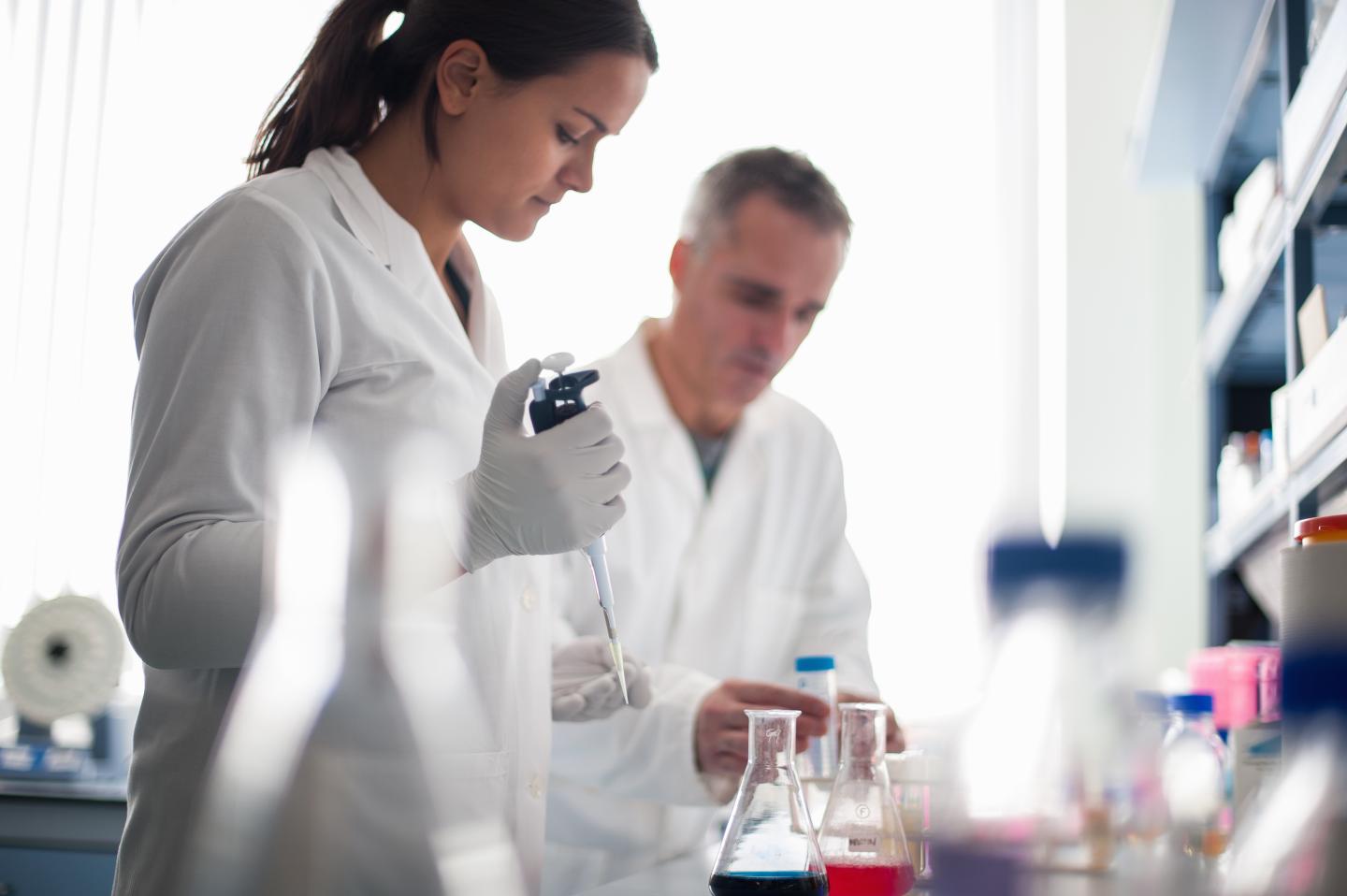 Medical student doing experiment in laboratory