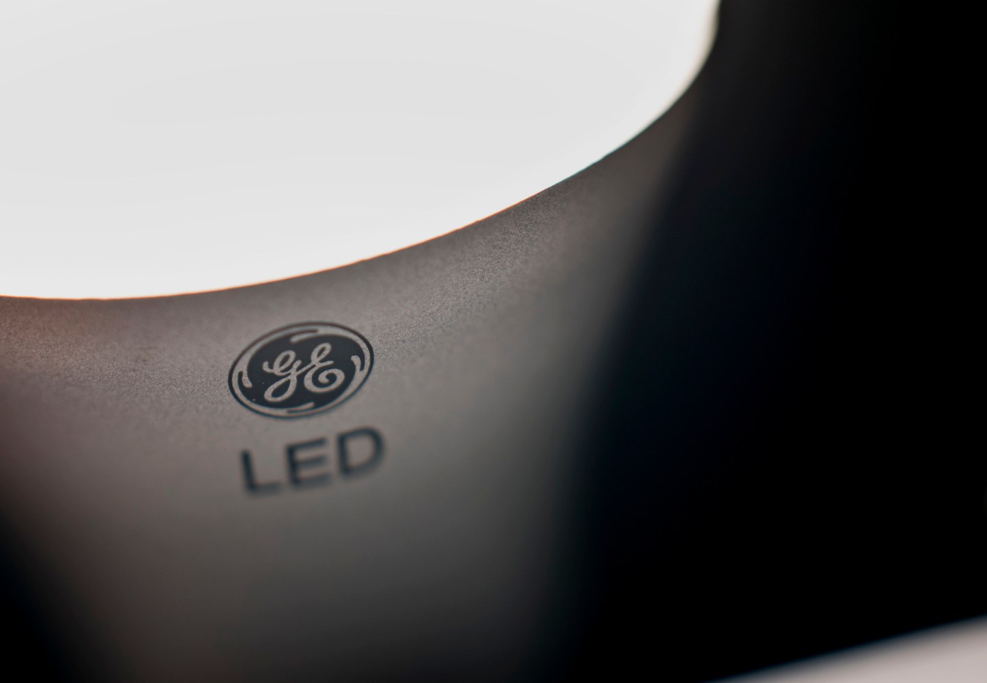 A General Electric Co. (GE) lightbulb is displayed for a photograph in Tiskilwa, Illinois, U.S., on Thursday, Jan. 22, 2015. General Electric Co. is scheduled to report fourth-quarter earnings on January 23. Photographer:  Daniel Acker/Bloomberg