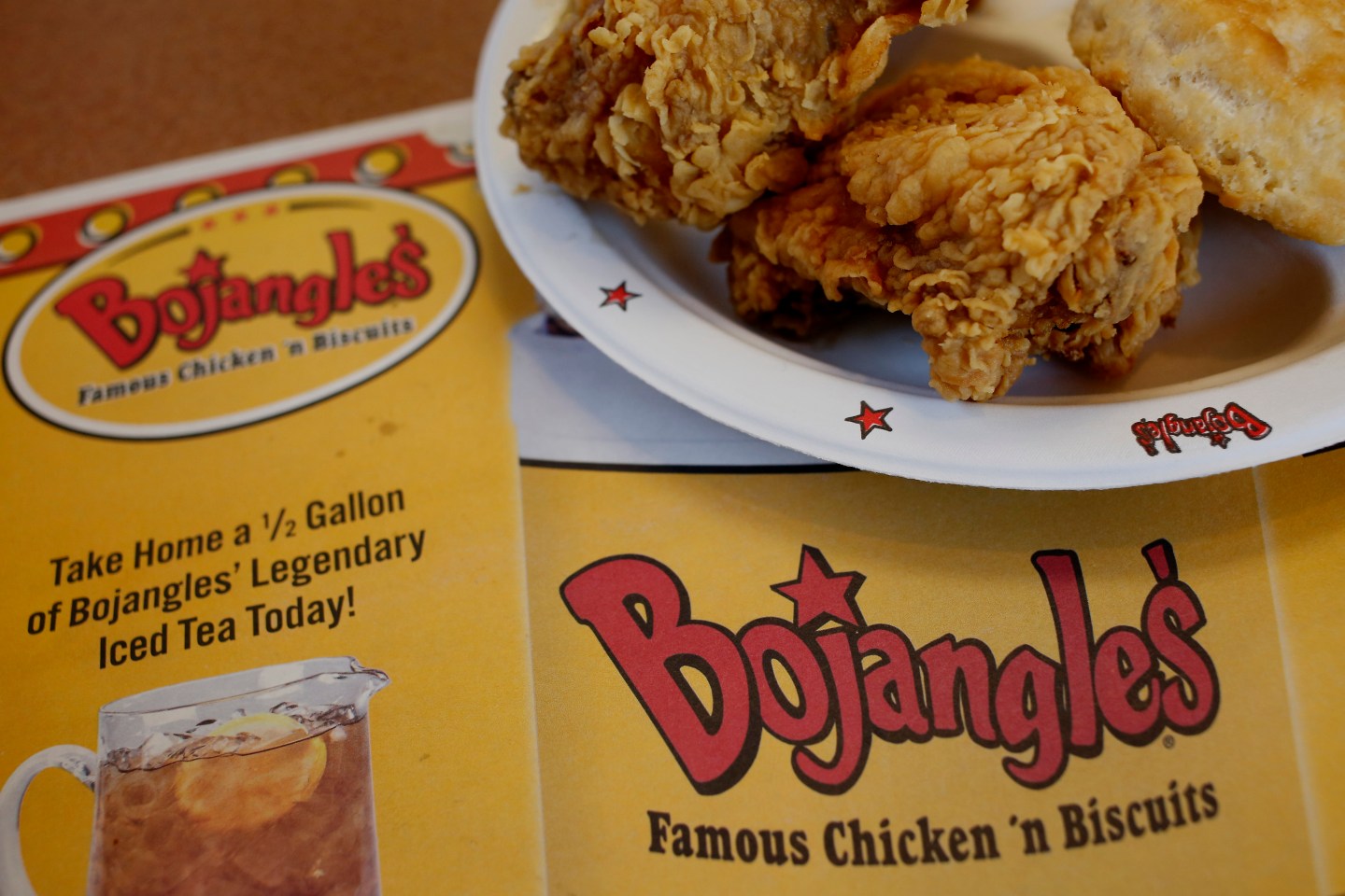 Menu times from a Bojangles Famous Chick 'n Biscuits fast food restaurant is arranged for a photograph in Murfreesboro, Tennessee, U.S. on May 8, 2015. Bojangles announced their initial public offering yesterday. Photographer : Luke Sharrett / Bloomberg
