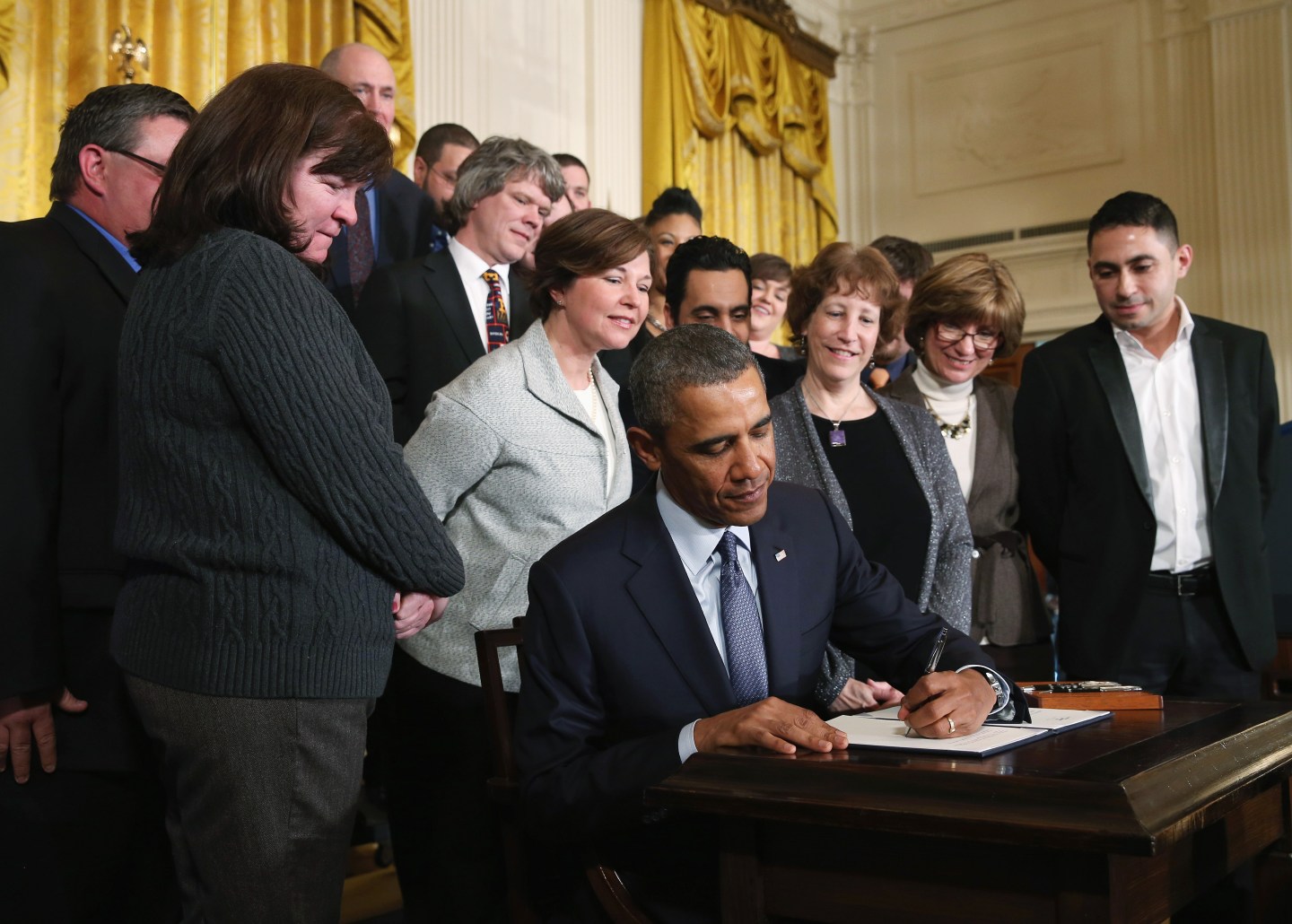 Obama Signs  Presidential Memorandum On Modernizing Overtime Protections