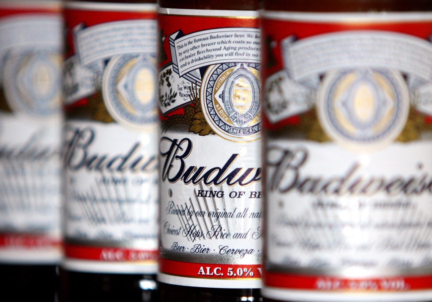 Bottles of Budweiser beer sit on display at a pub in Hornchu