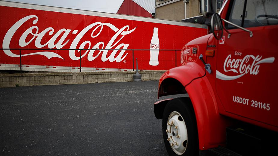 Coke’s smaller cans and bottles lead to bigger sales