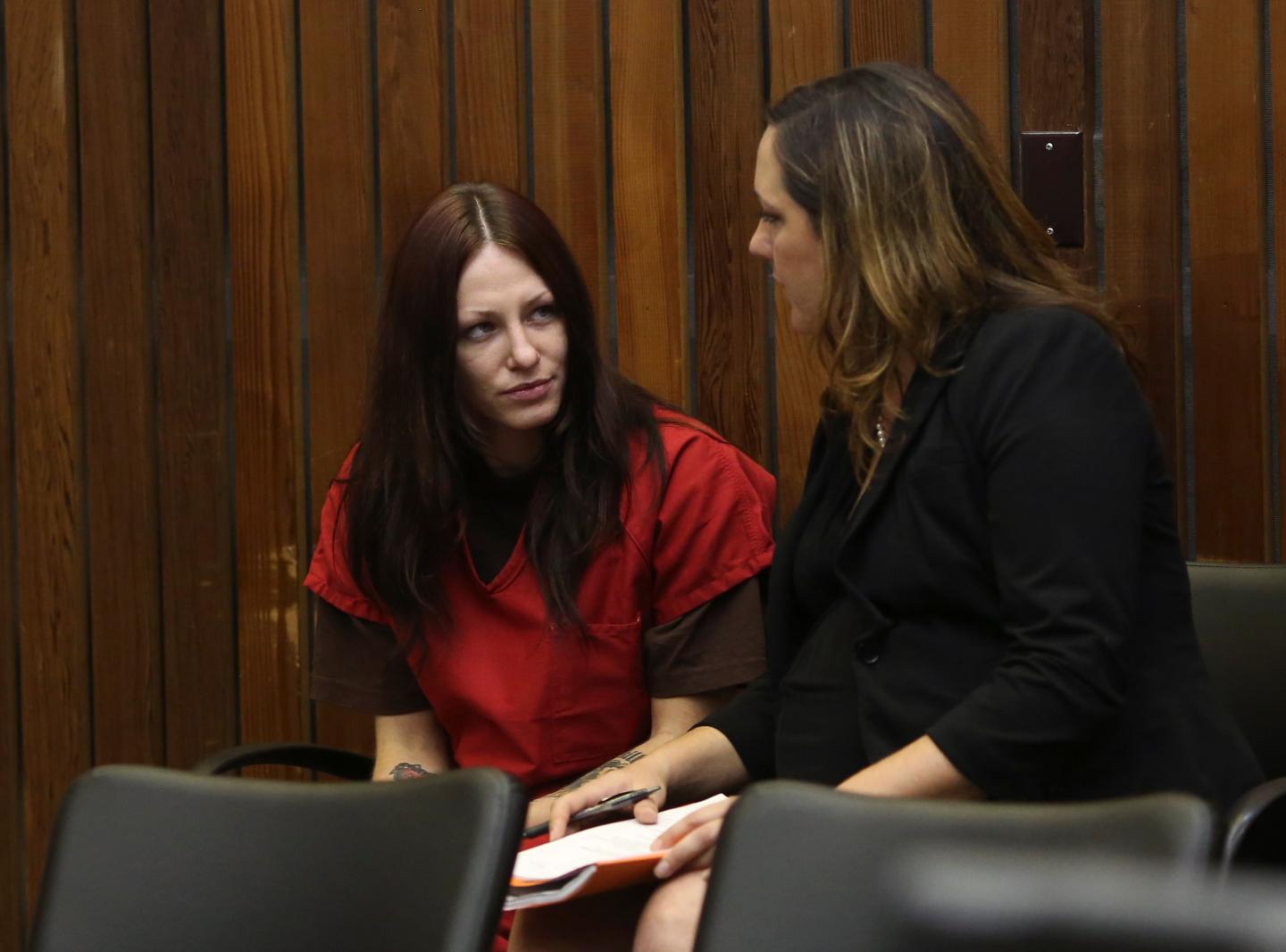 Alix Catherine Tichelman sits in the courtroom with her attorney, Athena Reis, during her arraignment in Santa Cruz