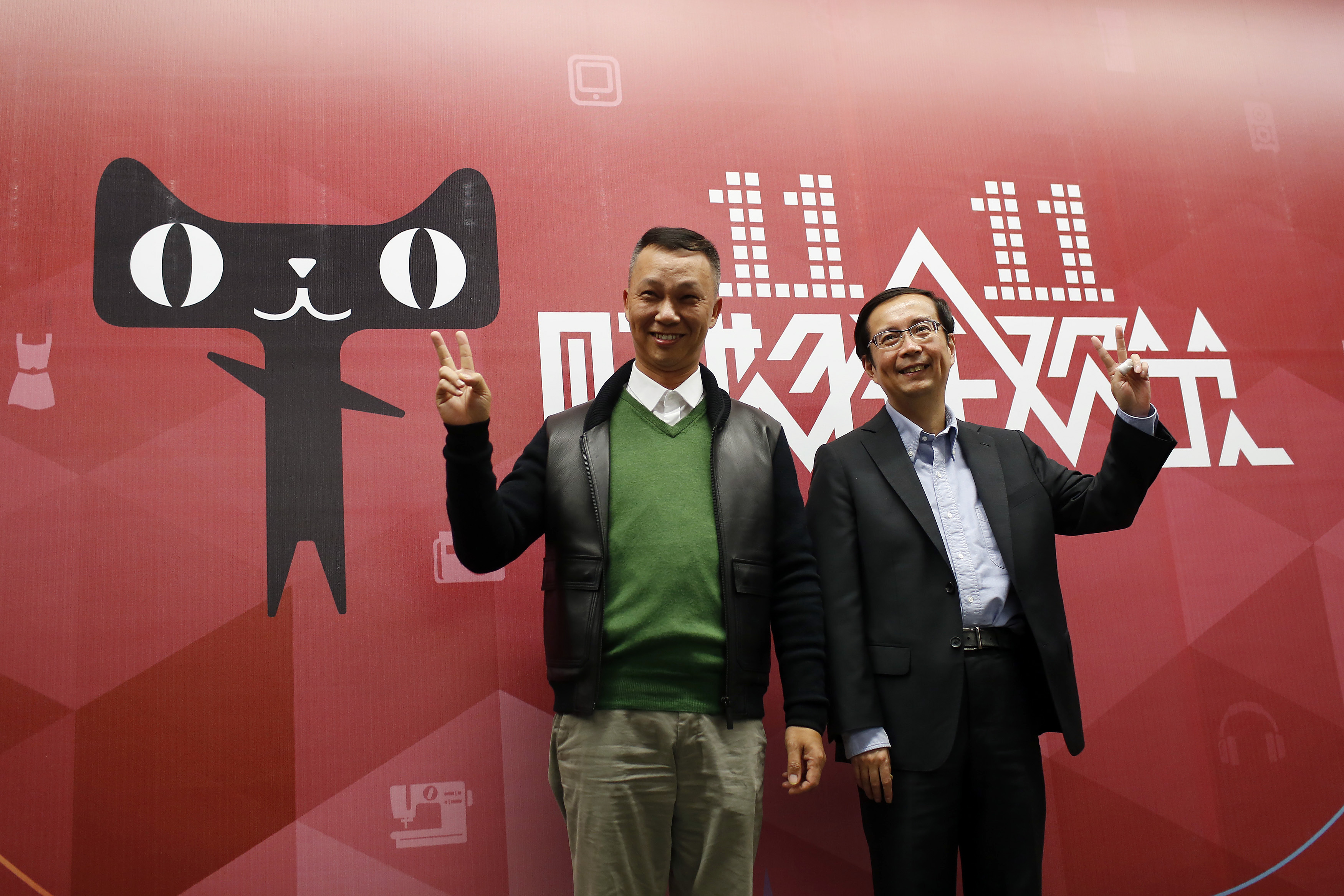 Alibaba Group CEO Jonathan Lu and Alibaba Group COO Daniel Zhang pose for a photo at the company's headquarters in Hangzhou