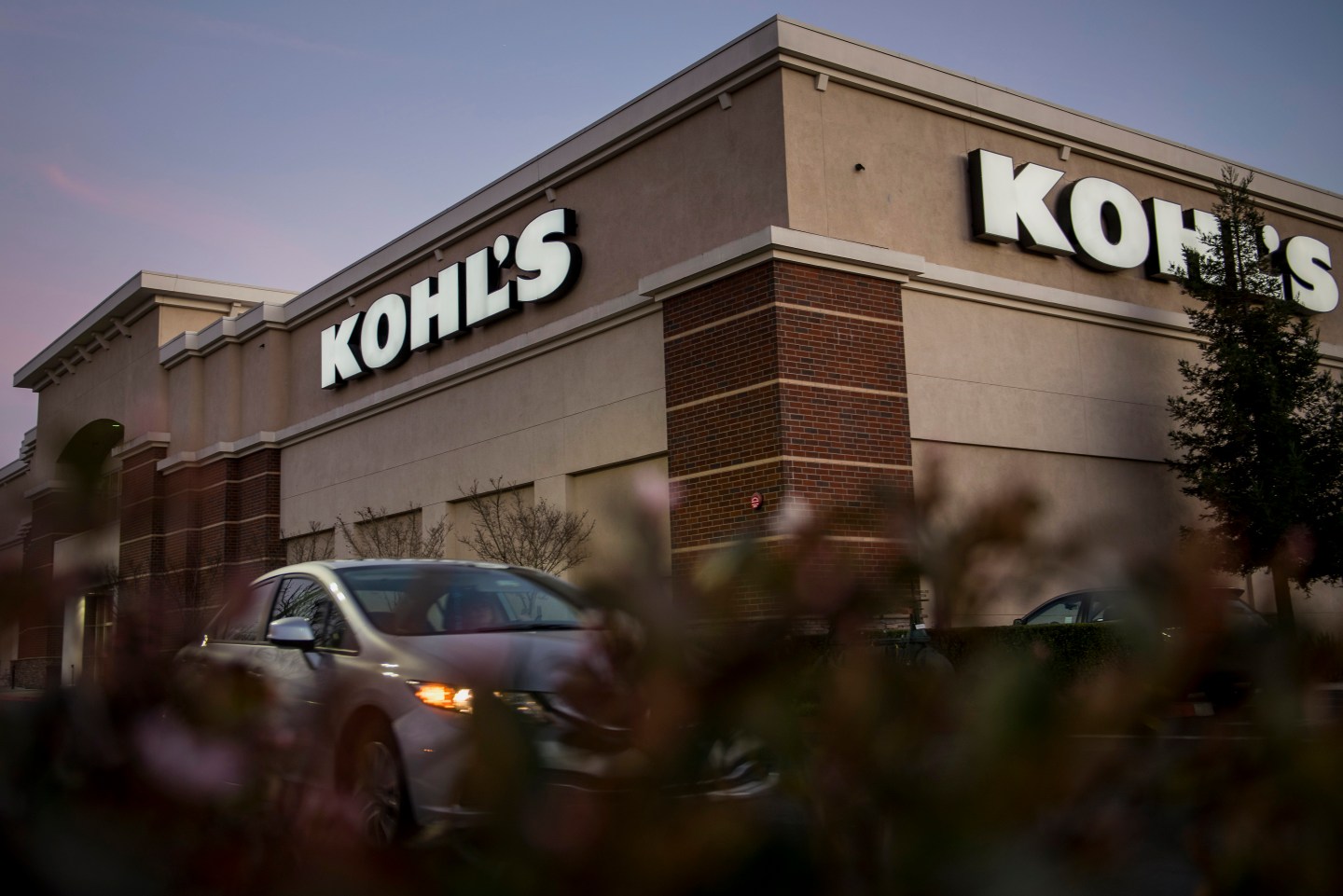 Kohl's Corp. signage is seen on the facade of a store in Concord, California, U.S., on Tuesday, Feb. 24, 2015. Kohl's Corp. is expected to release earnings figures on Feb. 26. Photographer: David Paul Morris/Bloomberg