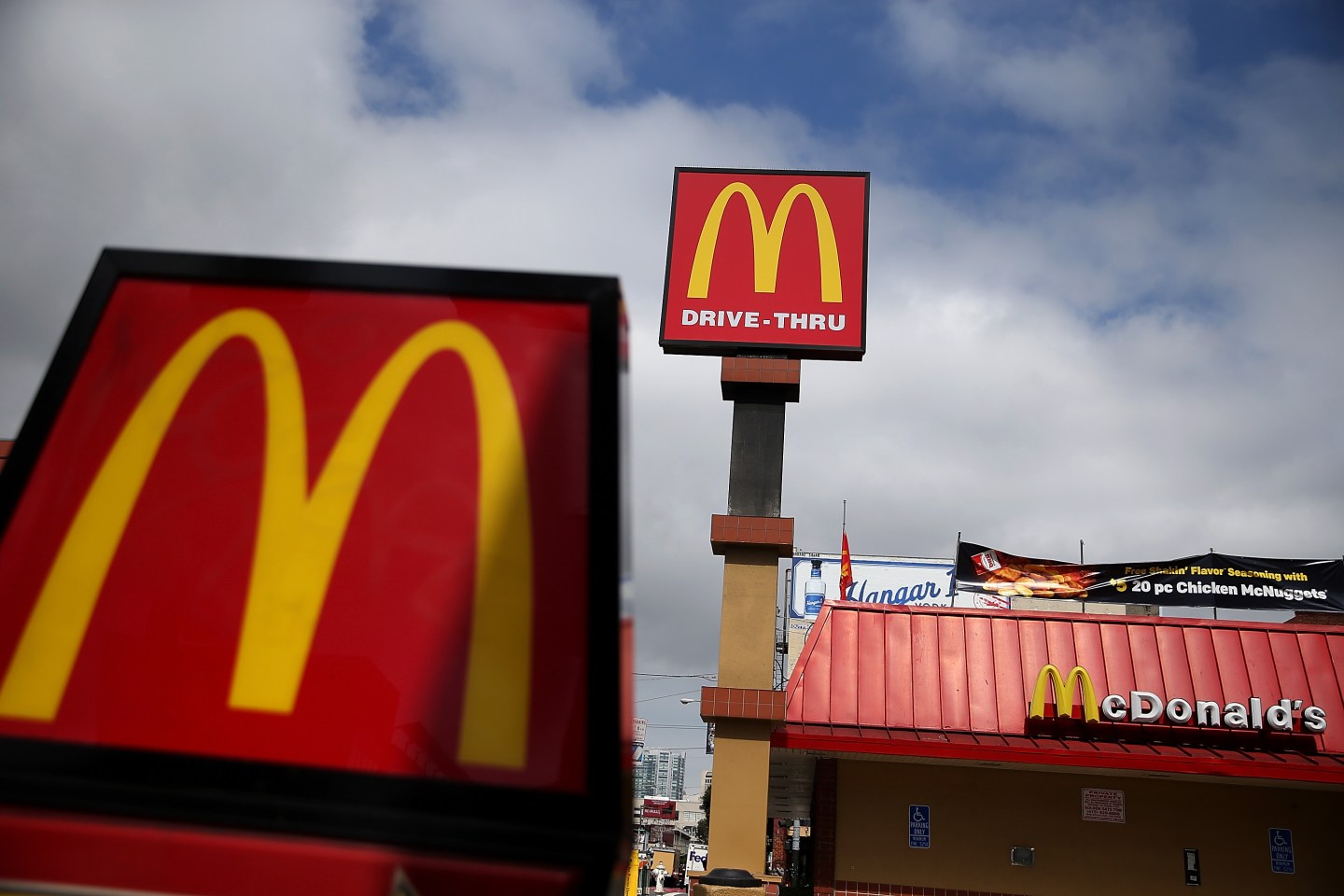 Signs are posted on the exterior of a McDonald's restaurant on April 22, 2015 in San Francisco, California.