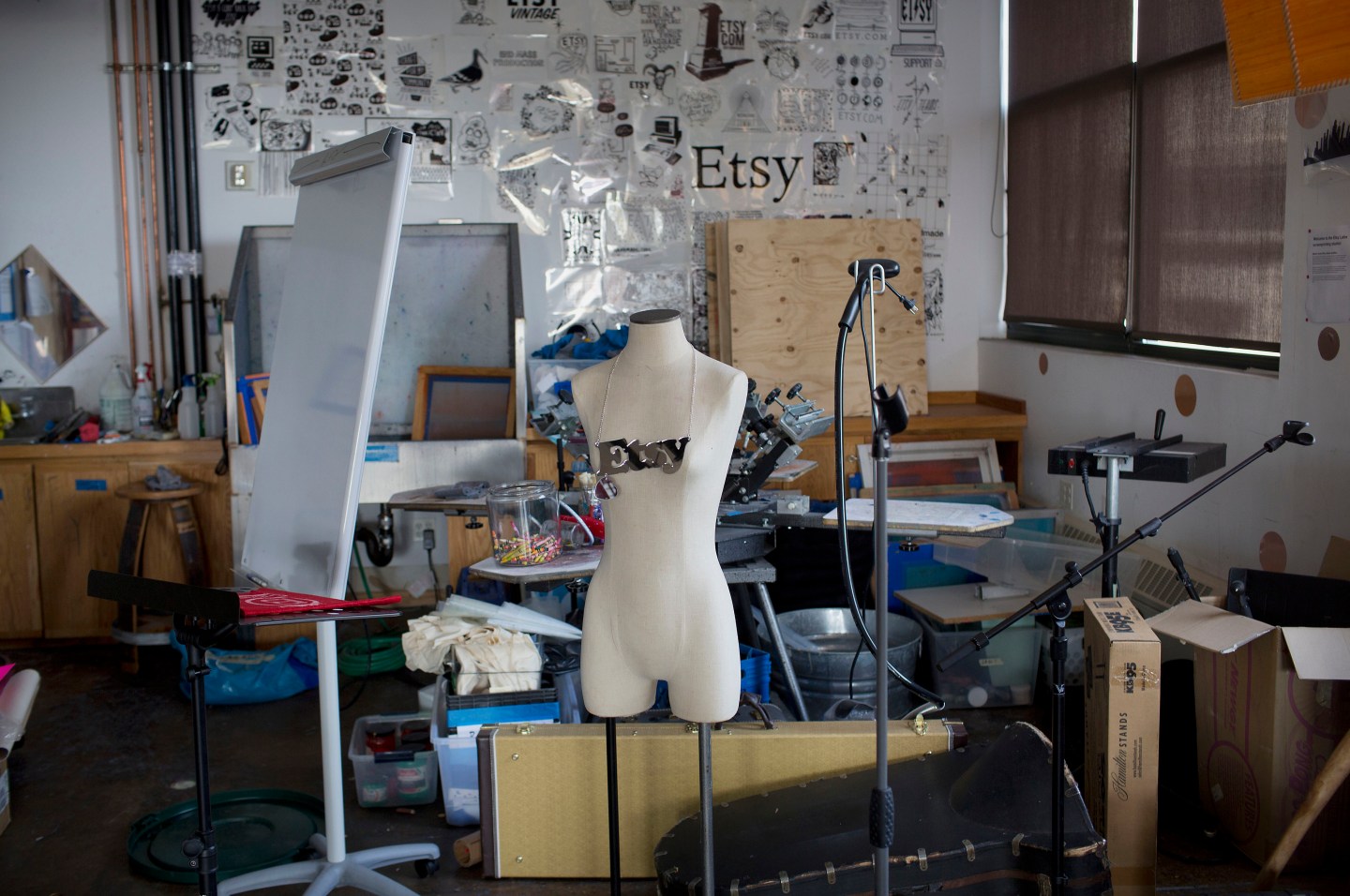 Caption:An Etsy necklace hangs on a mannequin in the craft lab at the company's headquarters in the Brooklyn borough of New York, U.S., on Monday, May 4, 2015. Etsy Inc., a marketplace for handmade and vintage goods, raised $267 million in its initial public offering. Photographer: Victor J. Blue/Bloomberg via Getty Images