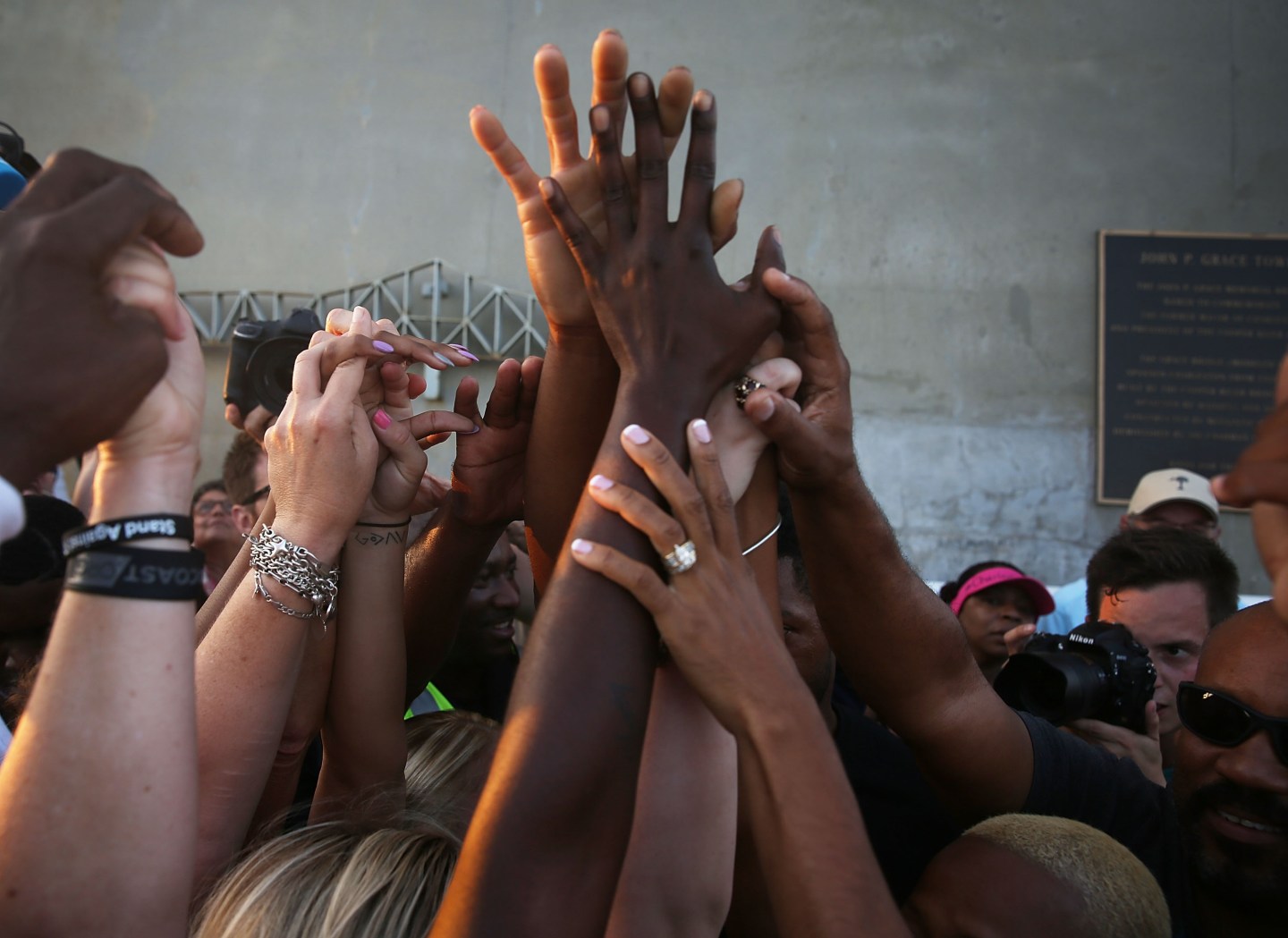Hands held in mourning on June 21, 2015 in Charleston, South Carolina.
