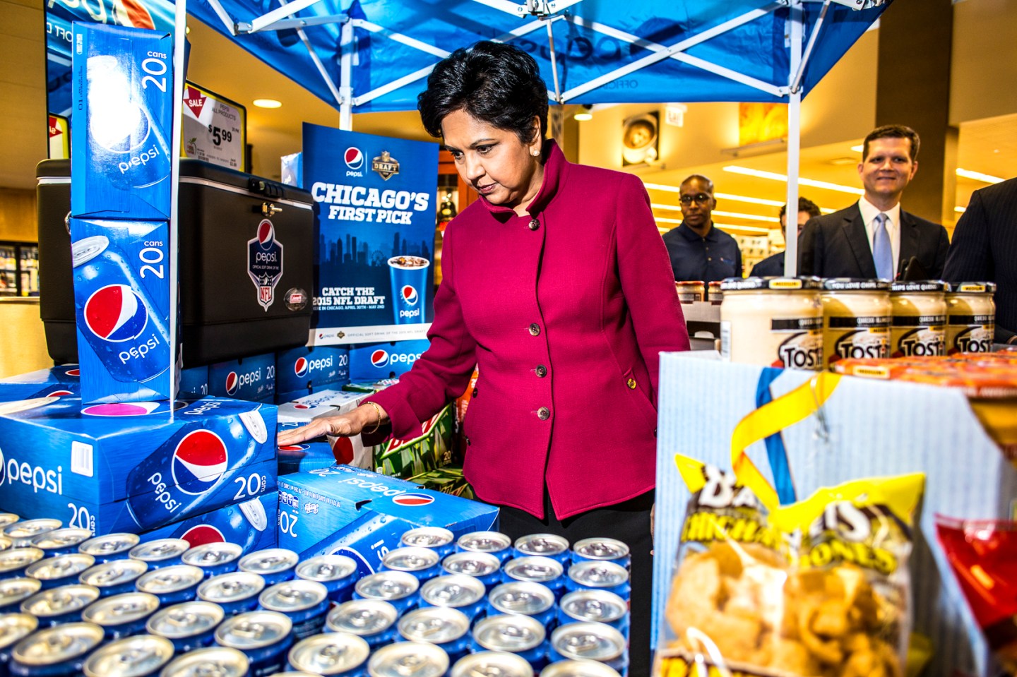 Indra Nooyi CEO of Pepsico touring Pete's Fresh Market in Chicago. April 2015